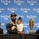 LeBron James of the Cleveland Cavaliers sits with his children, LeBron Jr., Zhuri and Bryce, during the postgame press conference after defeating the Golden State Warriors on June 19, 2016, to win the NBA Finals in Oakland, Calif.
Thearon W. Henderson/Getty Images